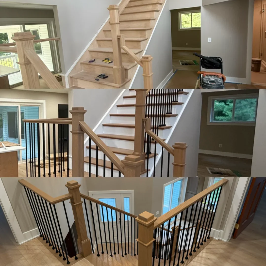 Oak staircase with oak newel posts, handrails, and black metal balusters over white-painted stringers